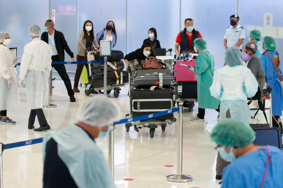 The first group of foreign tourists arrives at Suvarnabhumi Airport during the first day of the country's reopening campaign, part of the government's plan to jump-start the pandemic-hit tourism sector in Bangkok, Thailand November 1, 2021. Soe Zeya Tun, Reuters.