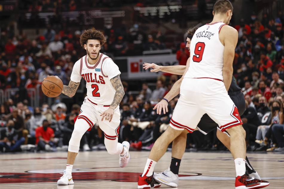 Chicago Bulls guard Lonzo Ball (2) brings the ball up court against the Brooklyn Nets during the first half at United Center. Kamil Krzaczynski, USA TODAY Sports/Reuters.