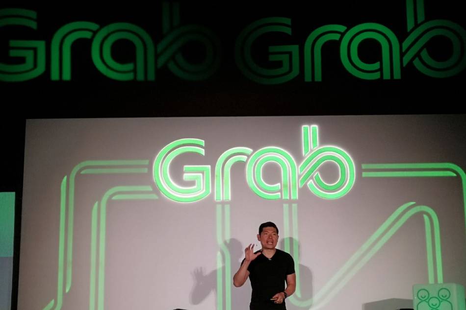 Grab founder and CEO Anthony Tan speaks to the media during a press conference at its Singapore headquarters in Marina One complex. Jessica Fenol, ABS CBN News/File