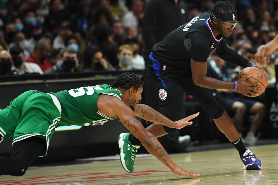 Los Angeles Clippers guard Reggie Jackson (1) moves the ball against Boston Celtics guard Marcus Smart (36) during the second half at Staples Center. Jayne Kamin-Oncea, USA TODAY Sports/Reuters.