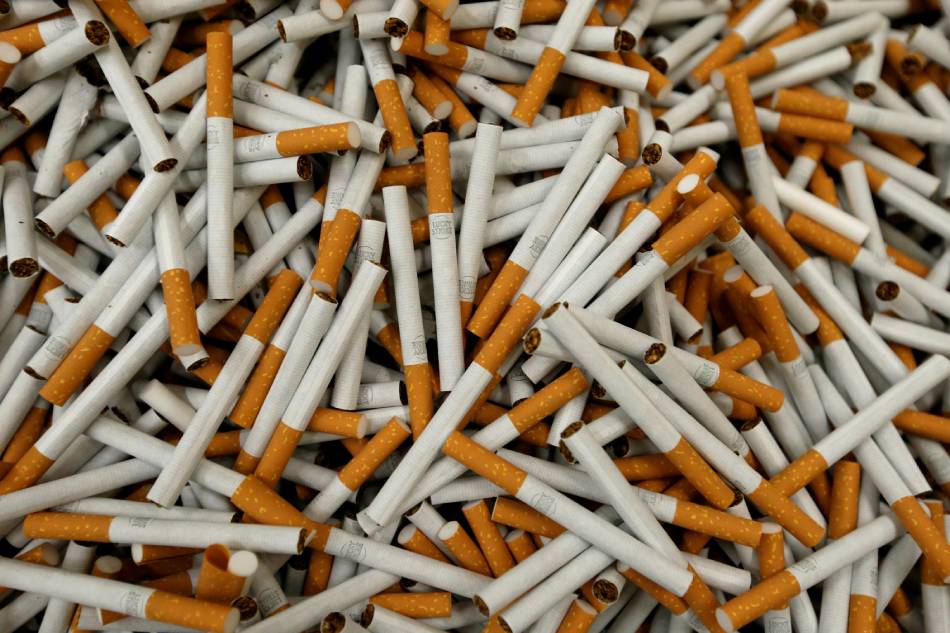 Lucky Strike cigarettes are seen during the manufacturing process in the British American Tobacco Cigarette Factory (BAT) in Bayreuth, Germany, April 30, 2014. Michaela Rehle, Reuters File Photo