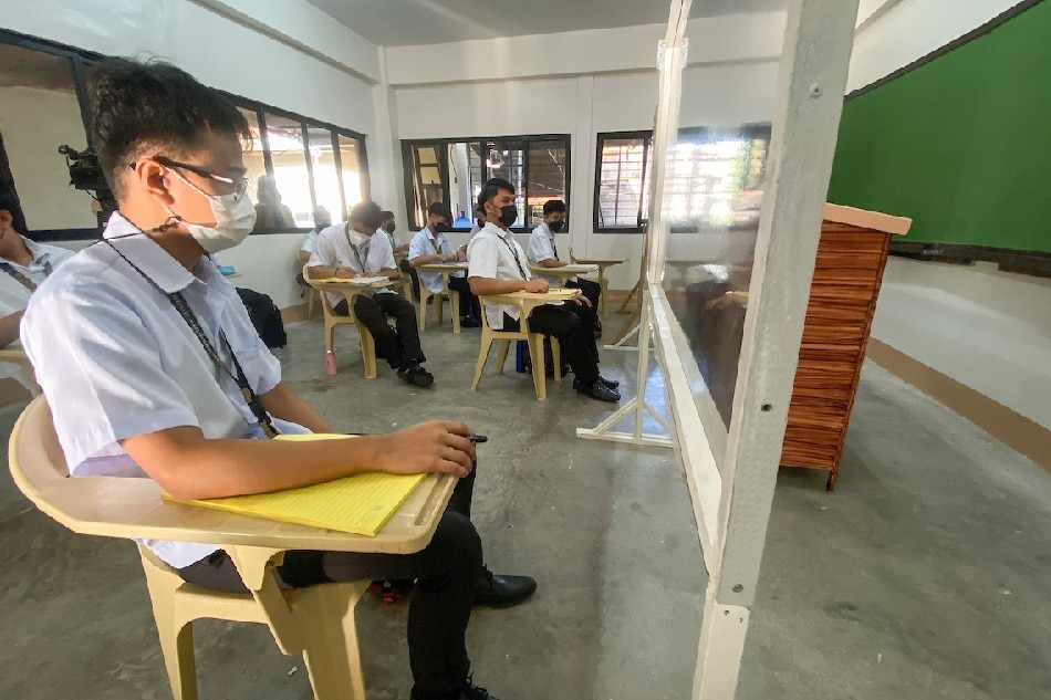 Students attend the pilot implementation of face-to-face classes at Mother of Good Counsel Seminary in San Fernando, Pampanga on November 22, 2021 as it reopens for a limited number of pupils. Jonathan Cellona, ABS-CBN News