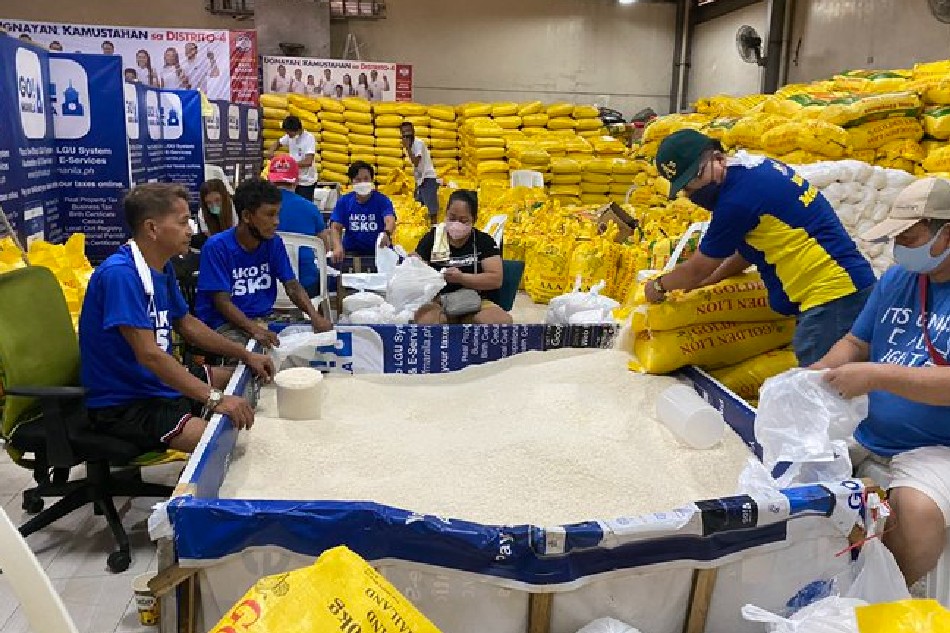 Manila residents help repack rice for victims of Typhoon Odette in Visayas and Mindanao on December 20, 2021. Katrina Domingo, ABS-CBN News