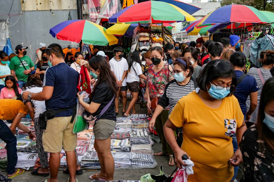 Vendors crowd the Redemptorist road beside the Baclaran Church in Parañaque City on December 15, 2021. George Calvelo, ABS-CBN News/file 