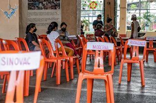 Empty chairs at vaccination sites