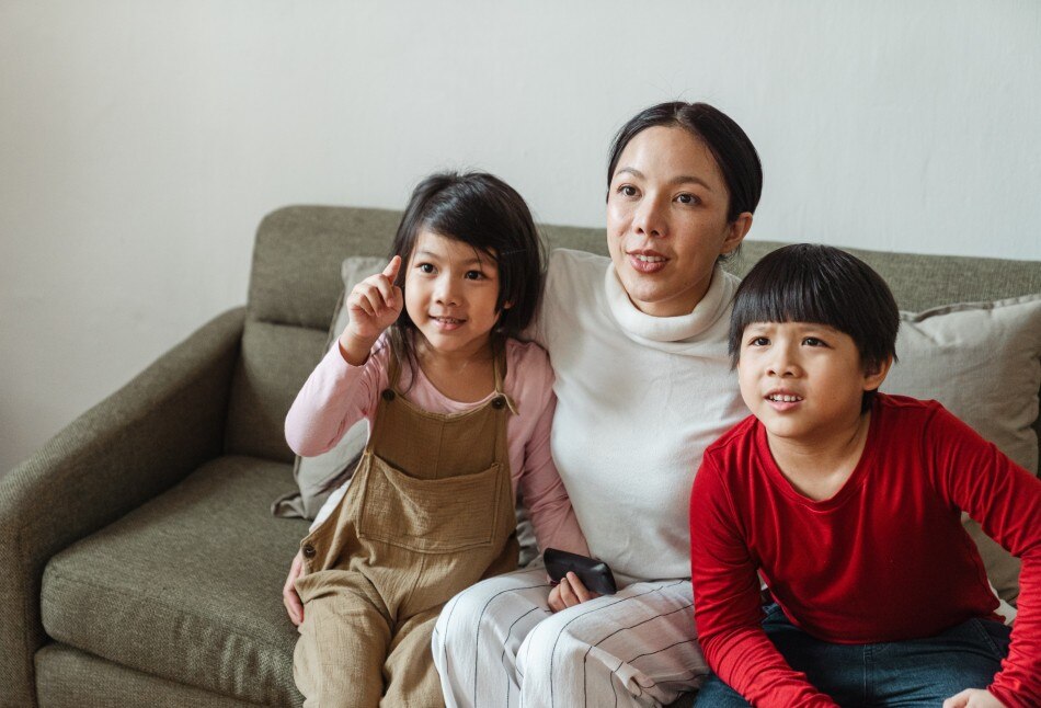 Watch new movies with the whole family while snuggled up in this cold weather.  Photo Courtesy: Pexels[LINKOUT'Pexels':https://wwwpexelscom/photo/adorable-little-asian-children-watching-fascinating-movie-with-mom-4474020/[LINKOUT'Pexels':https://wwwpexelscom/photo/adorable-little-asian-children-watching-fascinating-movie-with-mom-4474020/