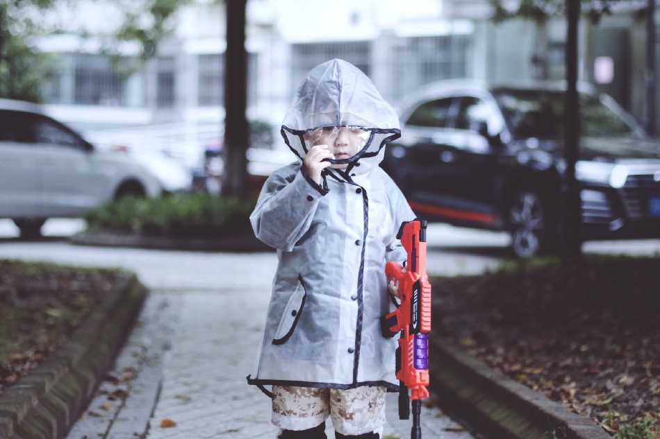 Photo source: Pexels [LINK OUT 'Pexels': https://www.pexels.com/photo/a-kid-standing-on-the-street-9660814/