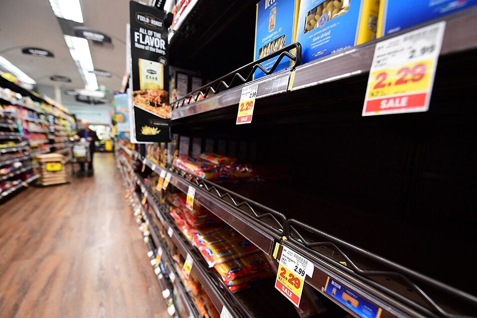 Empty shelves for pasta are seen at a supermarket on January 13, 2022 in Monterey Park, California. The ongoing strains of the coronavirus pandemic have led to sickened workers and staffing shortages for crucial supply-chain functions such as transportation and logistics, which affect the delivery of products and restocking of store shelves. Frederic J. Brown, Agence France-Presse