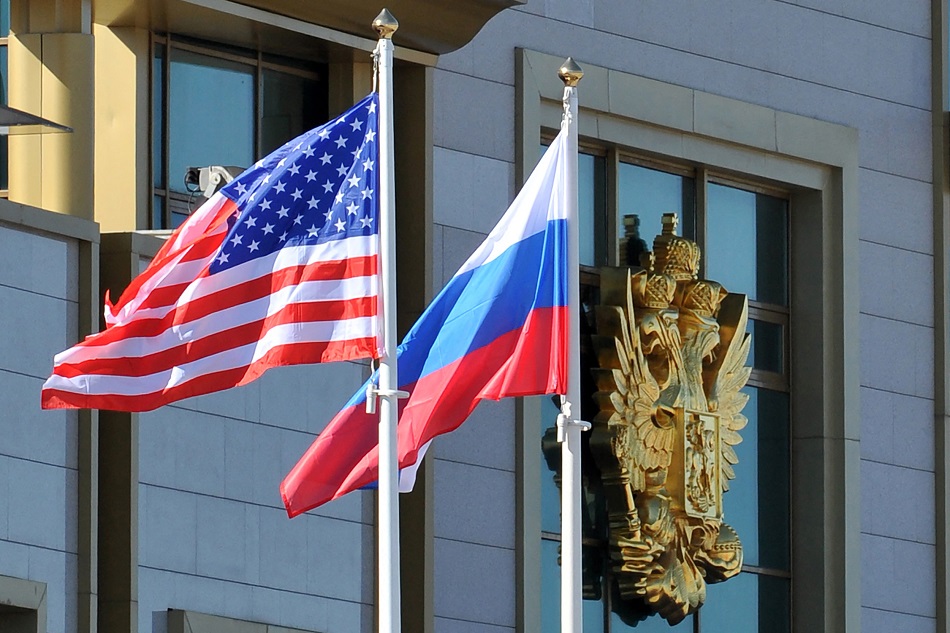 This photo taken on May 7, 2013 shows Russian and the US flags running up at Moscow Vnukovo Airport. Putin said on Tuesday he was ready to continue working with the West on security issues to de-escalate tensions over Ukraine. Mladen Antonov, AFP/file