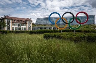 IOC calls for ban on Russians from world sports