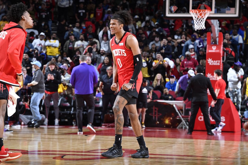 Josh Christopher (9) of the Houston Rockets and Jalen Green (0) celebrates during the game against the Los Angeles Lakers at the Toyota Center in Houston, Texas. Logan Riely, NBAE via Getty Images/AFP
