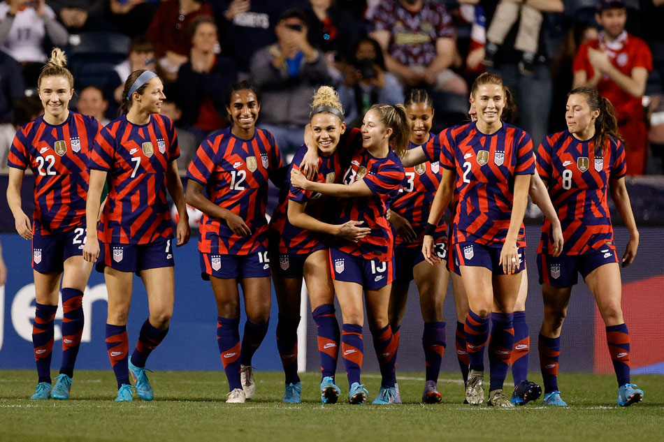 The United States celebrate a goal by Trinity Rodman #14 (C-L) during the second half against Uzbekistan at Subaru Park on April 12, 2022 in Chester, Pennsylvania. Tim Nwachukwu, Getty Images/AFP