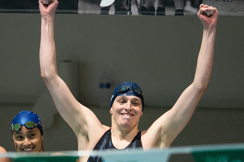 University of Pennsylvania swimmer Lia Thomas reacts after her team wins the 400 yard freestyle relay during the 2022 Ivy League Womens Swimming and Diving Championships at Blodgett Pool on February 19, 2022 in Cambridge, Massachusetts. Kathryn Riley/Getty Images/AFP