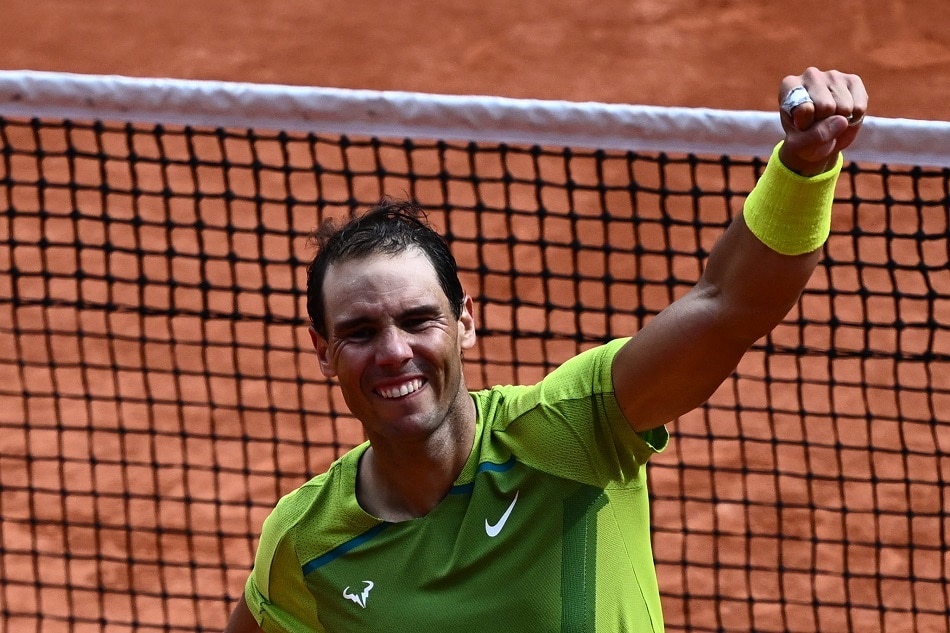 Spain's Rafael Nadal celebrates after winning against Norway's Casper Ruud at the end of their men's singles final match on day fifteen of the Roland-Garros Open tennis tournament at the Court Philippe-Chatrier in Paris on June 5, 2022. Anne-Christine Poujoulat, AFP