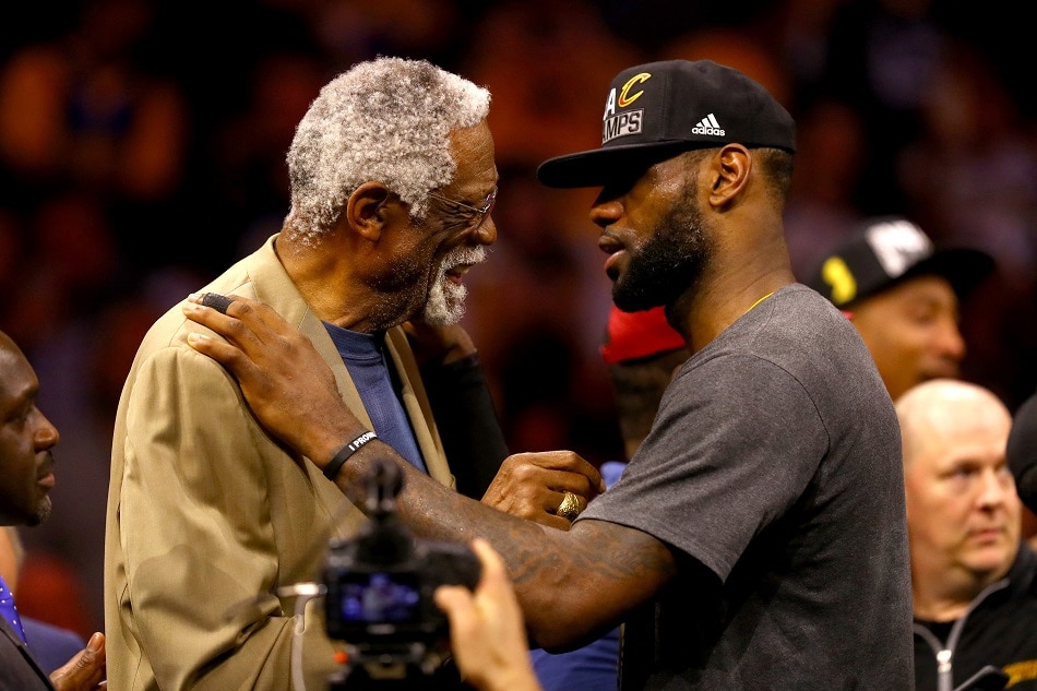 LeBron James speaks with Bill Russell after being named the NBA Finals MVP on June 19, 2016 in Oakland, Calif. Ezra Shaw/Getty Images/AFP/file