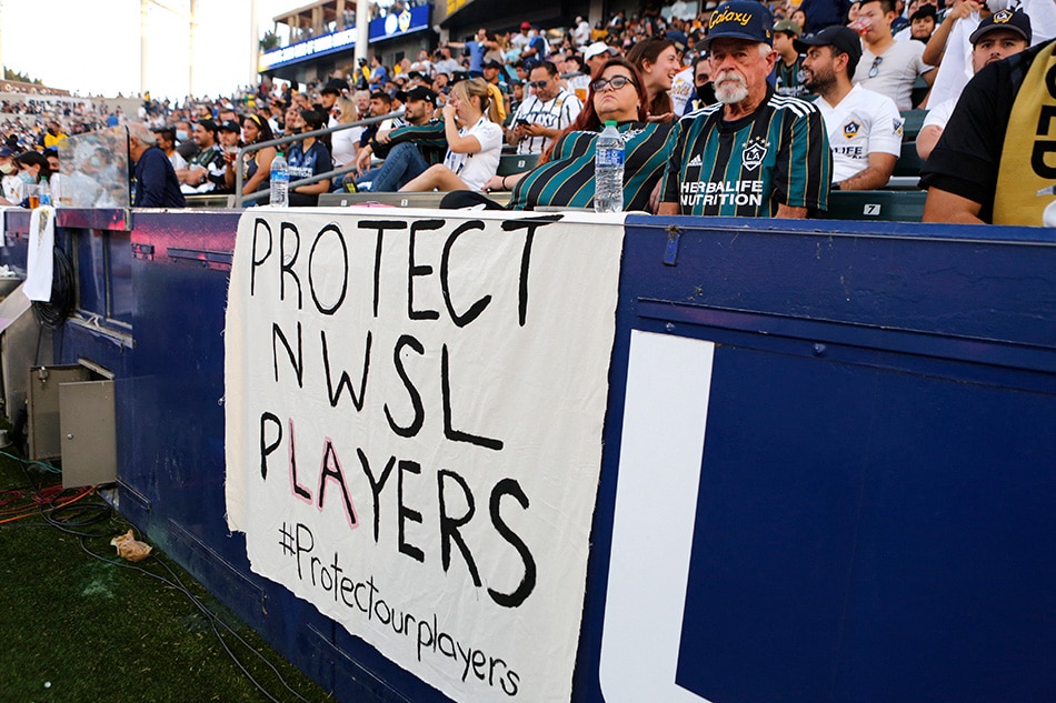 Signage supporting NWSL players is seen during a game between the Los Angeles Galaxy and the Los Angeles FC at Dignity Health Sports Park on October 03, 2021 in Carson, California. Katharine Lotze, Getty Images/AFP.
