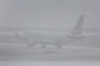 Holiday flights scrapped as massive winter storm sweeps US