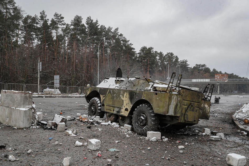 A damaged Ukrainian armored vehicle in the aftermath of an overnight shelling at the Ukrainian checkpoint in Brovary near Kiev (Kyiv), Ukraine, March 1, 2022. Sergey Dolzhenko, EPA-EFE