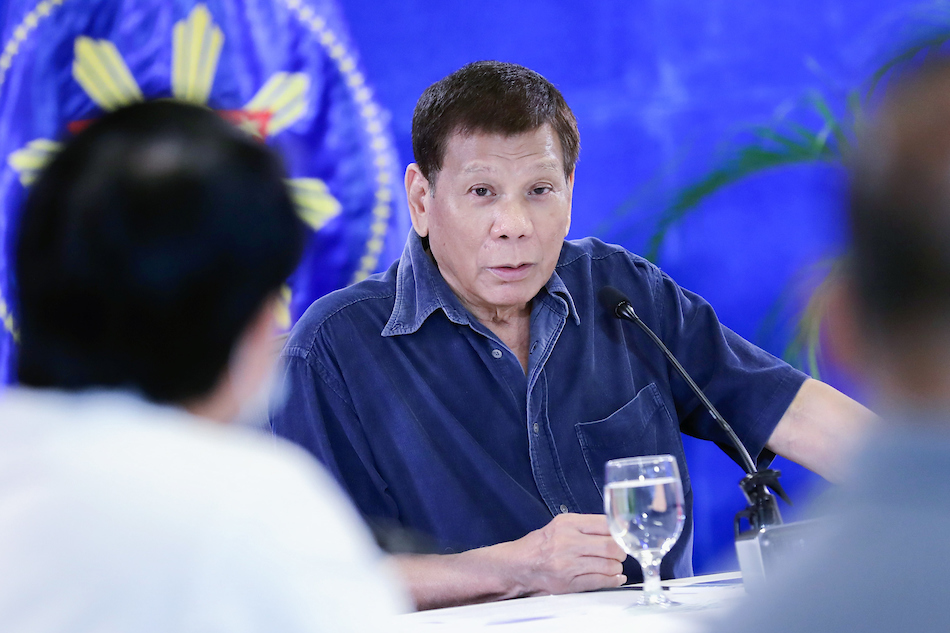 President Rodrigo Duterte presides over a meeting with key government officials prior to his 