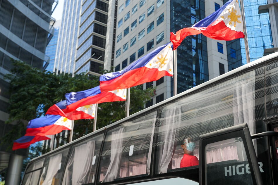 Philippine flags fly outside the Philippine Stock Exchange at Bonifacio Global City in Taguig on June 18, 2021. Jonathan Cellona, ABS-CBN News/File