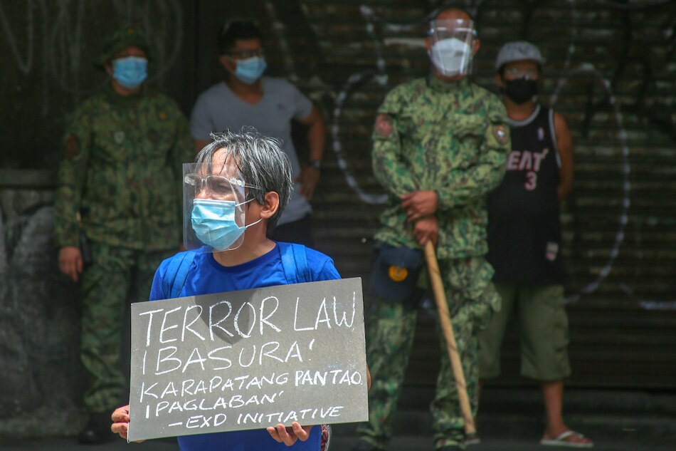 Members of different labor and human rights groups join a protest march against the anti-terror law in Manila on July 19, 2021. Jonathan Cellona, ABS-CBN News