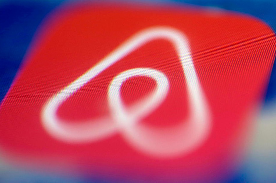 A photo illustration shows the app icon of US online rental vacation company Airbnb displayed on a mobile phone in Oestrich-Winkel, Germany, 04 February 2021 (issued 05 February 2021). Mattia Sedda, EPA-EFE/File