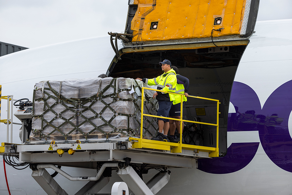 Workers unload a FedEx plane carrying the second shipment of baby formula under Operation Fly Formula at Dulles Airport in Chantilly, Virginia, USA, 25 May 2022. The US is facing a shortage of baby formula when contamination forced Abbott Laboratories to stop production of several brands of formula in February. Jim Lo Scalzo, EPA-EFE