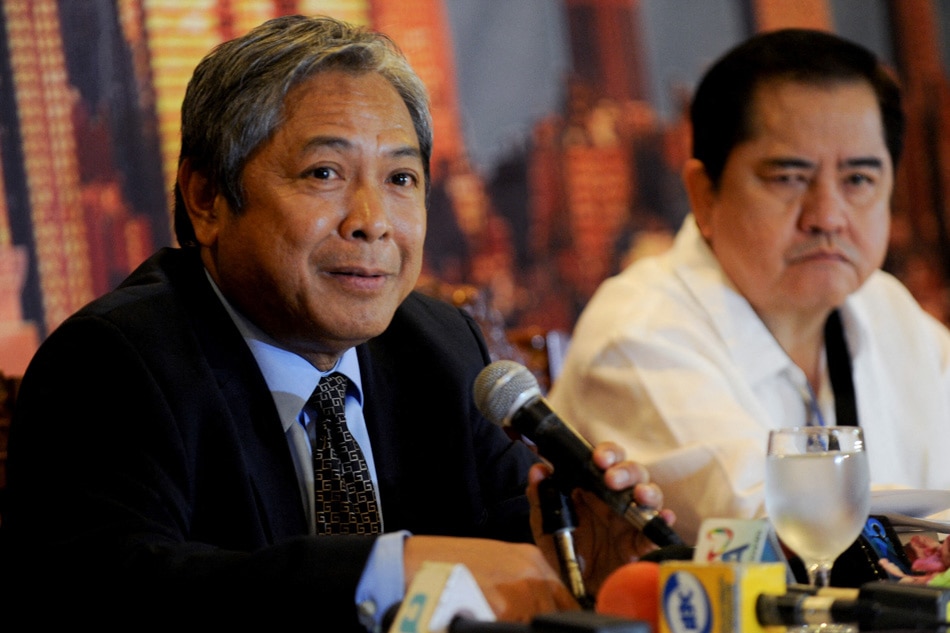Jaime Bautista (left) President and COO Philippine Airlines speaks as David Lim (right) Senior Vice-President Commercial Group (PAL) looks on during a briefing in Manila on November 14, 2014. Philippine Airlines (PAL) will open new local and and international routes in the next three years, including Manila to New York, which will start in March next year, Bautista told reporters. Jay Directo, AFP/ File