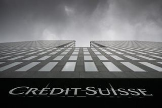 Moody's, S&P downgrade Credit Suisse, sinking shares