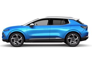 GM unveils electric SUV aimed at middle class