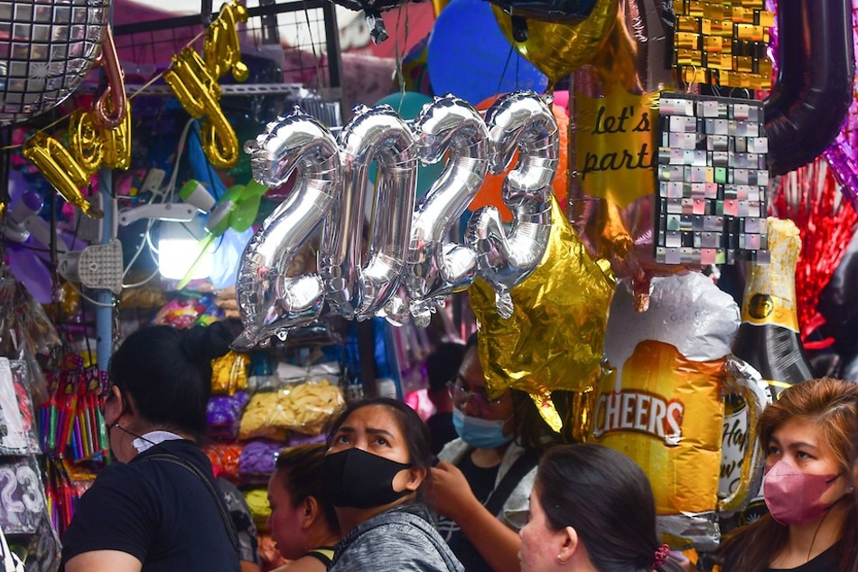 Decorative balloons for the new year 2023 go for sale in Manila on December 26, 2022. Mark Demayo, ABS-CBN News