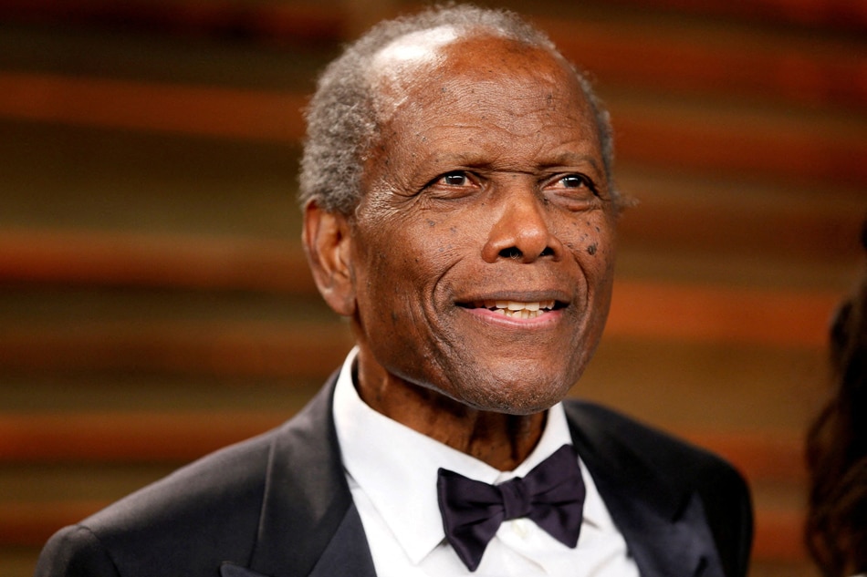 Actor Sidney Poitier arrives at the 2014 Vanity Fair Oscars Party in West Hollywood, California March 2, 2014. Danny Moloshok, Reuters/File Photo