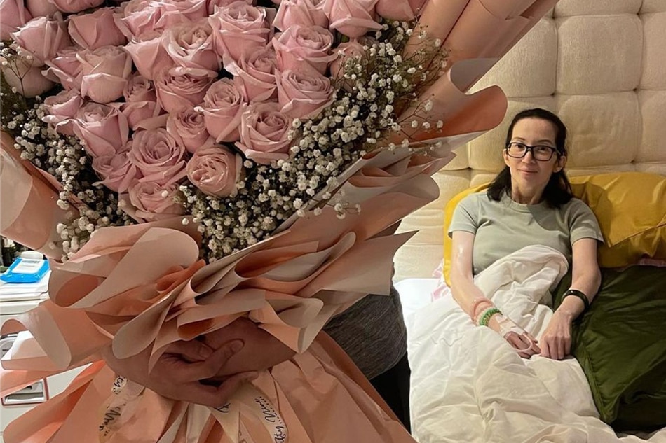 Kris Aquino shares a photo of her with a bouquet of flowers she received while in recovery. Instagram: @krisaquino