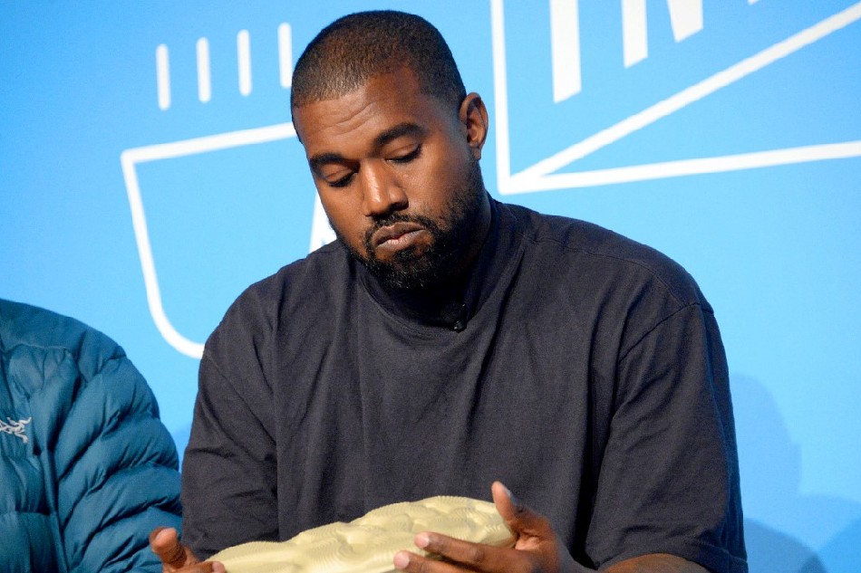 Kanye West speaks on stage at the 