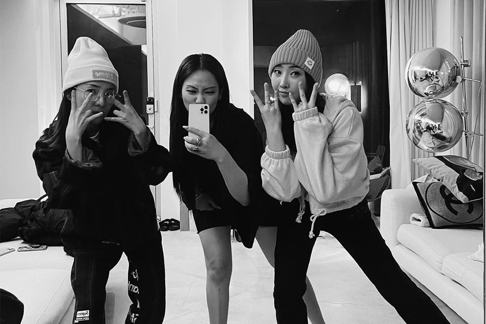 Dara, CL and Minzy of the defunct K-pop girl group 2NE1 posted the same photo of each other on their social media accounts on March 9, 2022. Instagram/@daraxxi