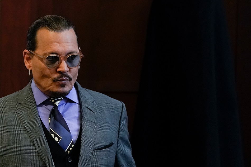 Actor Johnny Depp arrives at Fairfax County Circuit Court during his defamation case against ex-wife, actor Amber Heard, in Fairfax, Virginia, USA, 04 May 2022. US actor Johnny Depp sued his ex-wife US actress Amber Heard for libel in Fairfax County Circuit Court after she wrote an op-ed piece in The Washington Post in 2018 referring to herself as a 'public figure representing domestic abuse.' EPA-EFE/ELIZABETH FRANTZ / POOL