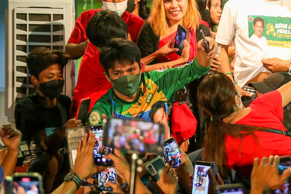 Senatorial candidate Robin Padilla greets and mingles with supporters during a UniTeam campaign sortie in Narvacan, Ilocos Sur on February 17, 2022. Jonathan Cellona, ABS-CBN News