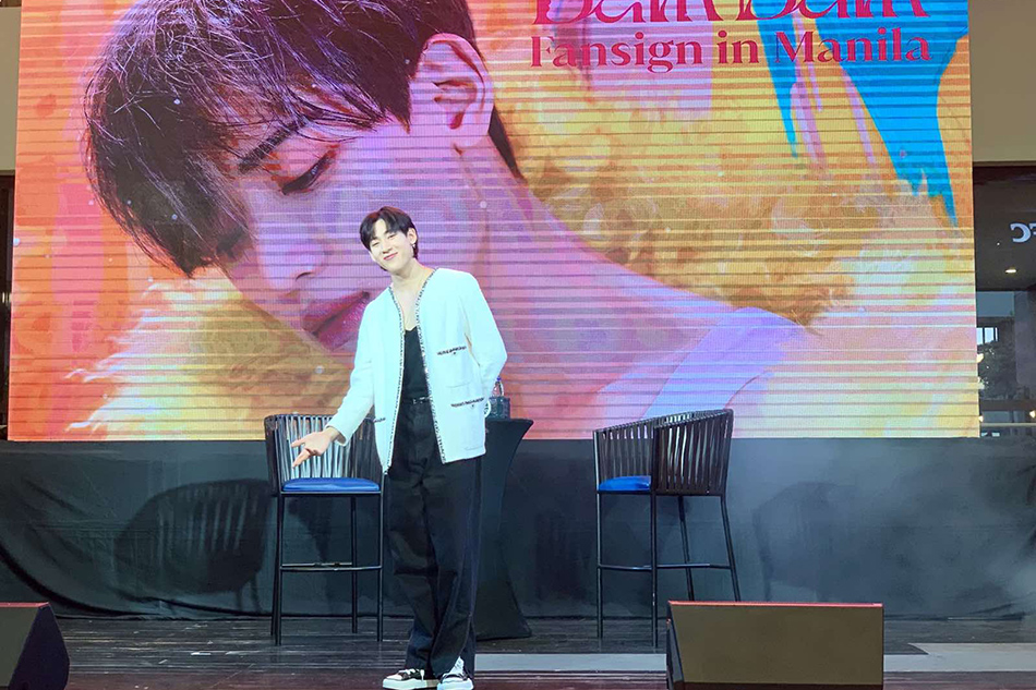 Thai-born K-pop star and global artist Bambam poses for his fans before the media conference and fan event at the Ayala Malls Manila Bay on Thursday, July 28, 2022.