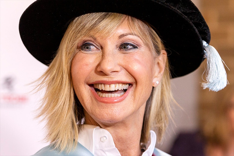 British-Australian singer and actress Olivia Newton-John talks to the media ahead of receiving an Honorary Doctorate of Letters at a special graduation ceremony at La Trobe University, Union Hall, Melbourne, May 14, 2018. Daniel Pockett, EPA-EFE/Australia and New Zealand Out/file