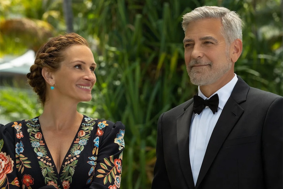 Movie review: Clooney, Roberts return to rom-com in 'Ticket to Paradise'