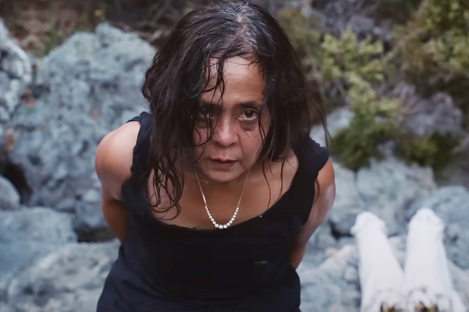 Dolly de Leon portrays Abigail, a luxury yacht cleaning lady who becomes a leader figure among the marooned passengers, in the Ruben Östlund film ‘Triangle of Sadness.’ Screenshot