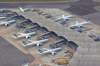 Cathay to further reduce flights amid COVID curbs
