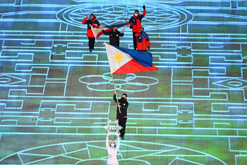 The Philippines' flag bearer Asa Miller leads AFP