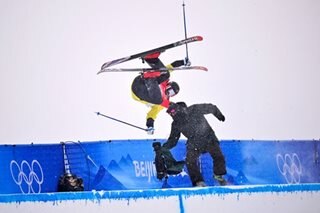 Finnish skier clips camera operator in halfpipe run
