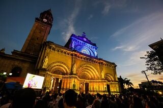 Manila Cathedral in yellow, blue for Ash Wednesday
