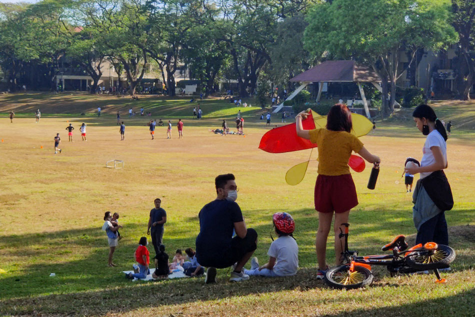 People spend leisure time at the University of the Philippines - Diliman in Quezon City on March 6, 2022, after Metro Manila eased to COVID-19 Alert level 1. Mark Demayo, ABS-CBN News