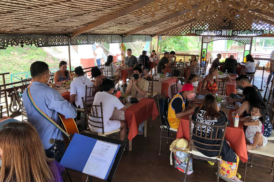 Tourists enjoy the buffet lunch at one of the floating restaurants cruising the Loboc River in Bohol, after the popular attraction reopened on March 1. Photo courtesy of Loboc Tourism Office