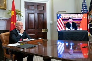 Xi speaks out against 'conflict' in call with Biden on Russia