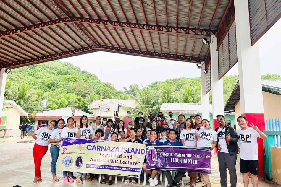 A group of lawyers from the Integrated Bar of the Philippines' Cebu Chapter along with IBP national officers and paralegal volunteers on Carnaza Island in Cebu. They were stranded on the island due to Tropical Storm Agaton, and it was during that time that seven of the paralegals received news they passed the 2020/2021 bar exams. Courtesy: Atty. Cheryl Pamela Condat.