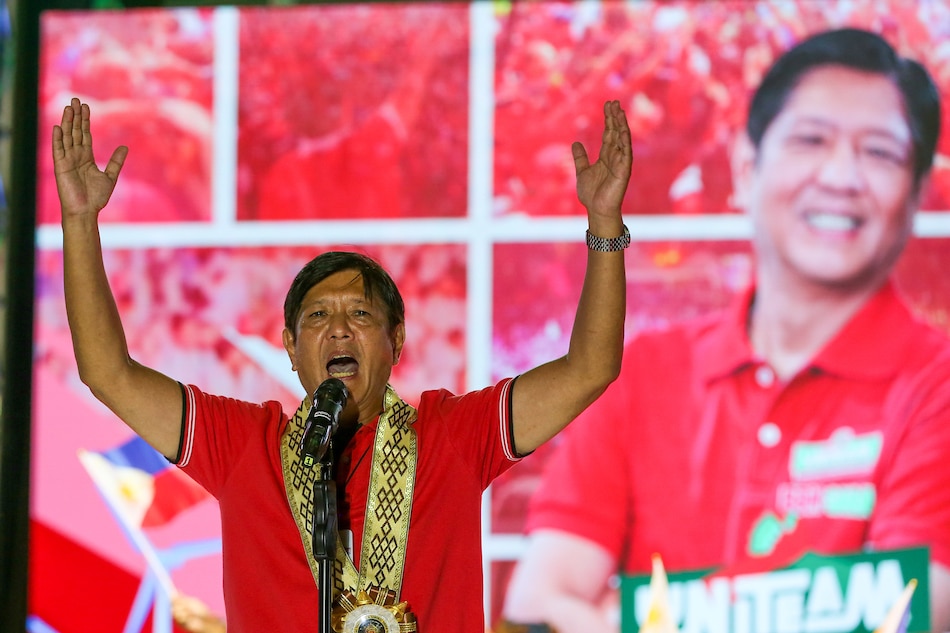 Presidential candidate Ferdinand Marcos Jr. greets supporters during a a grand rally at the Lima Commercial Estate along the border of Lipa and Malvar Batangas on April 20, 2022. A Commission on Elections division has junked the remaining disqualification case against the former senator, ruling that thecase based on Marcos' failure to file income tax returns lacked merit. Jonathan Cellona, ABS-CBN News